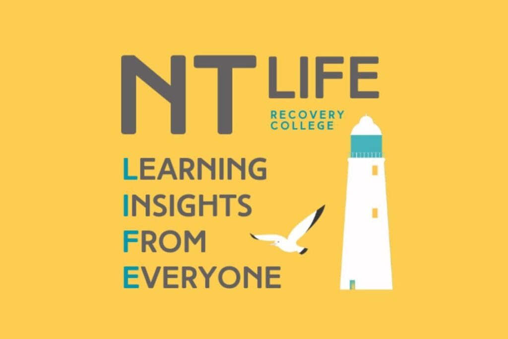NT LIfe Logo with white lighthouse on yellow background.